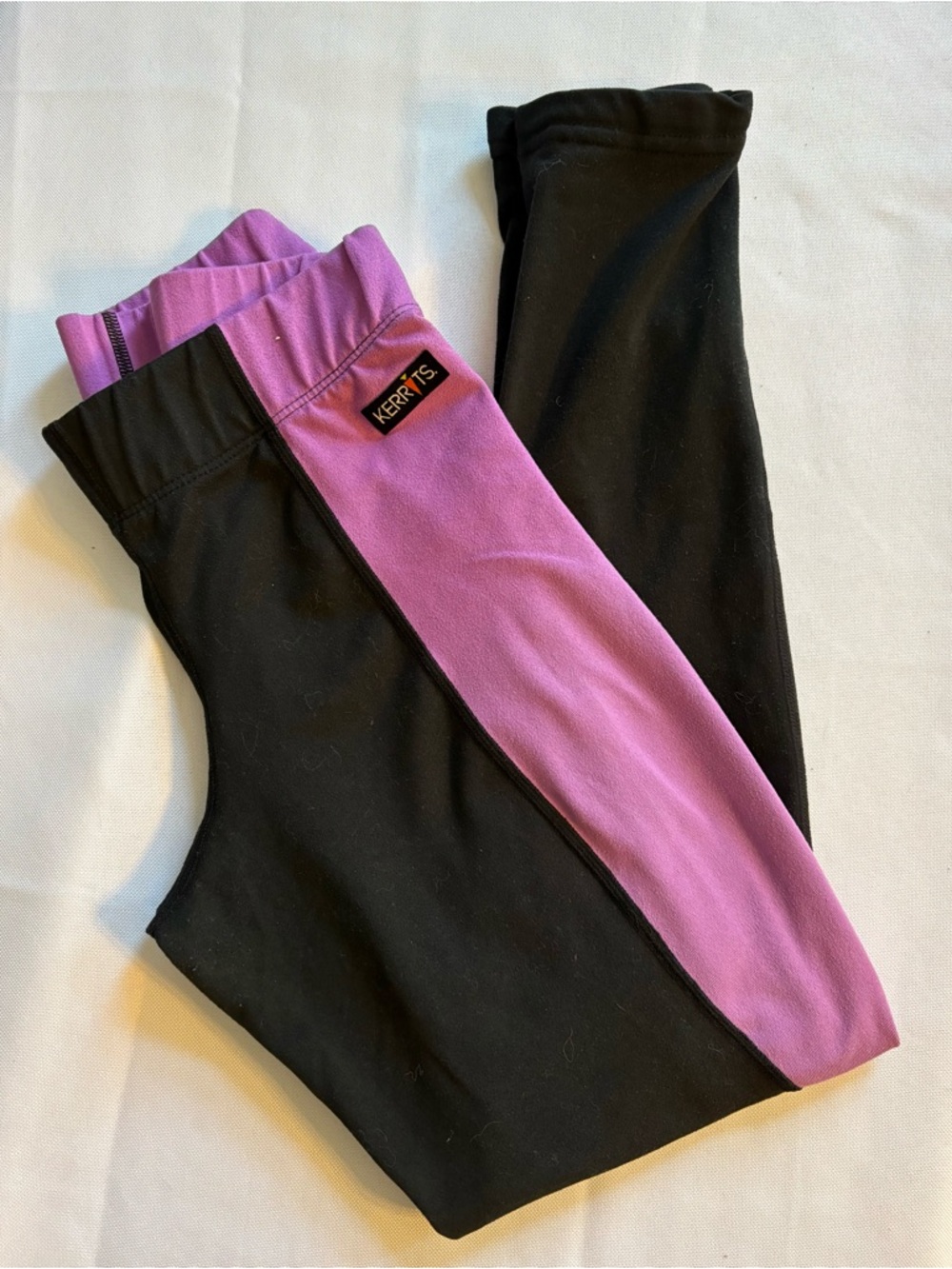 Kerrits Black and Purple Riding Leggings with faux suede knee patch